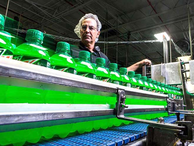 Man overseeing bottle line