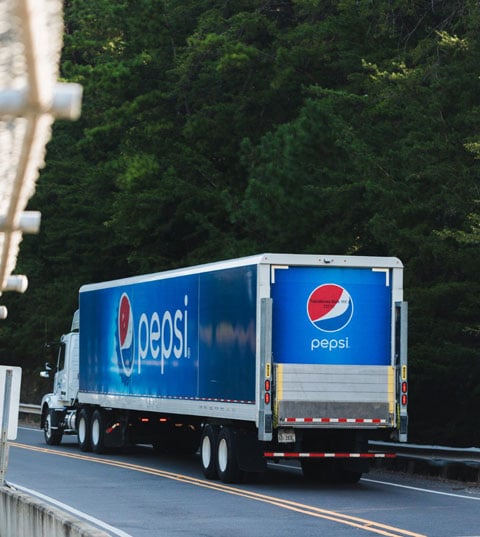 Pepsi truck on the highway