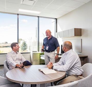 Men taking in office