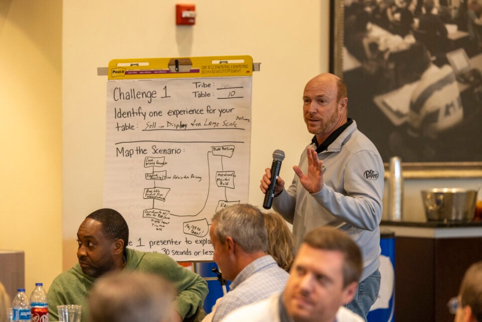 Employee-Partner presenting at Leadership Academy