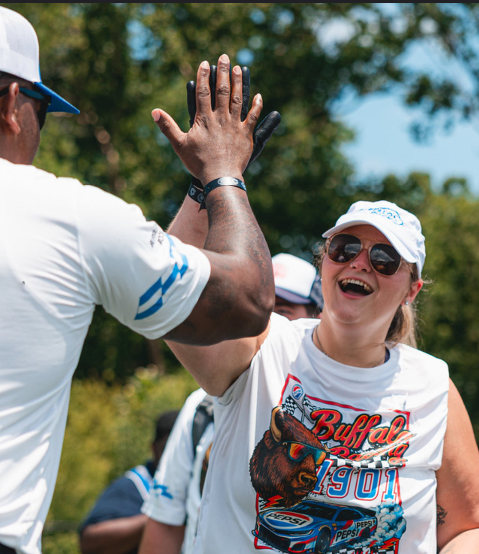 Teammates high fiving
